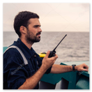 VHF radio and microphone on a yacht