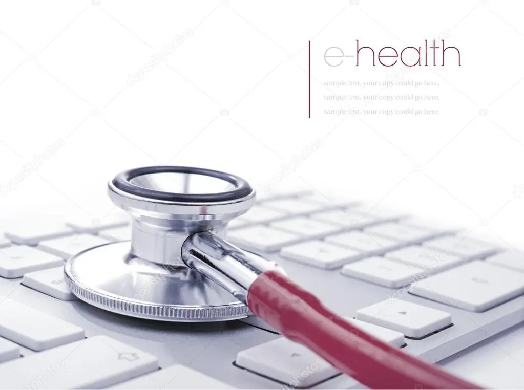 Computer repair bench with open laptop and tools