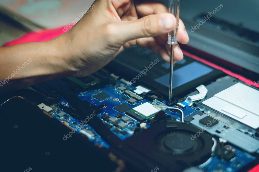 Technician repairing a computer